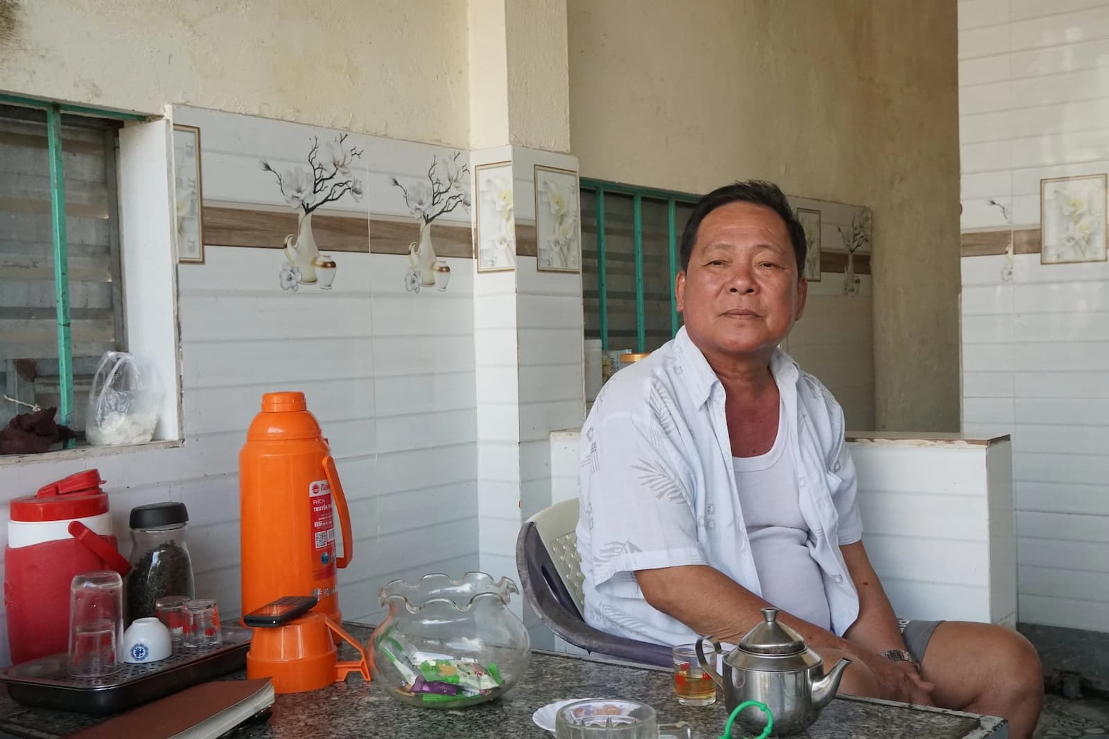 Nhan, a 64-year-old third-generation villager from Vinh Tuong, is worried about the potential loss of livelihoods in the new settlement (Image: Minh Tran)