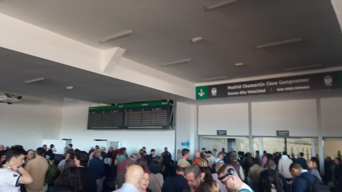 Passengers waiting at Madrid's railway station during the blackout.