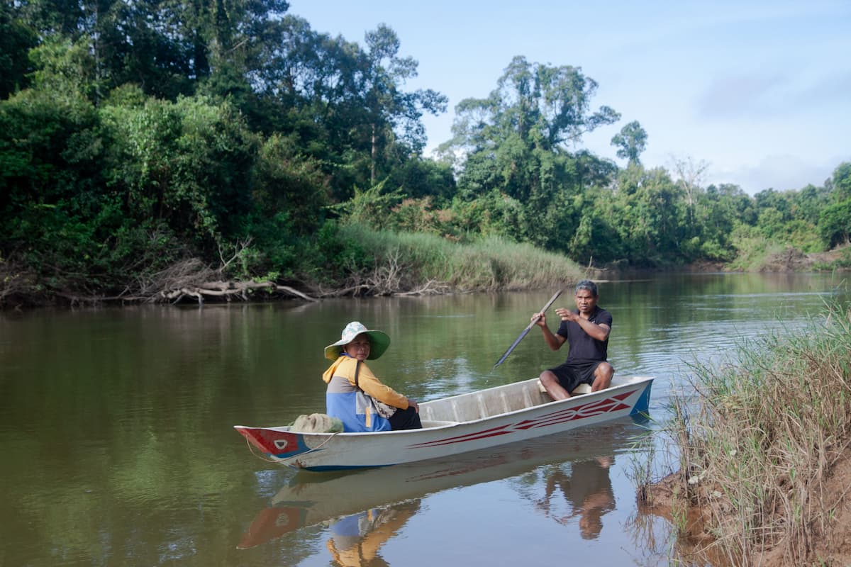 Nheuk Choeun and her husband Van Bo worry daily about food since their farmlands were absorbed into the Southern Cardamom REDD+ project. Image by Gerald Flynn / Mongabay.