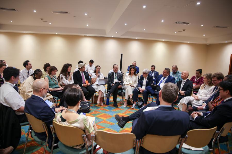 Country representatives, including Panama’s special representative on climate change, Juan Carlos Monterrey Gómez; the climate envoy for the Marshall Islands, Tina Stege; COP30 CEO, Ana Toni; UK special representative on climate, Rachel Kyte; and Tuvalu climate minister, Dr Maina Talia, participating in a closed-door breakout session. Credit: Earth Negotiations Bulletin
