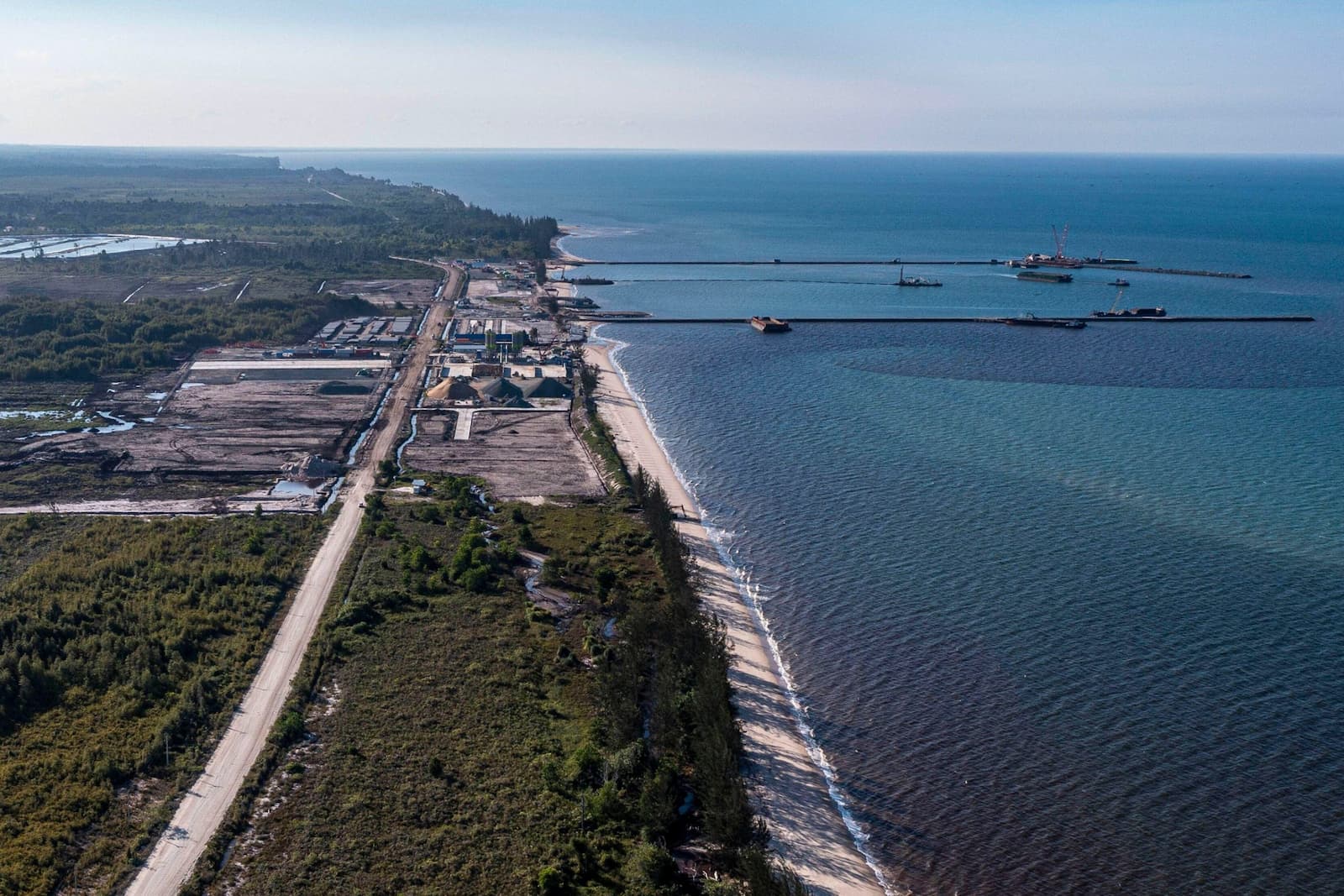 The under-construction Kalimantan Industrial Park in Indonesian Borneo, photographed in August 2023. It will eventually include a new oil refinery and petrochemicals complex (Image: Yusuf Wahil / Associated Press / Alamy)