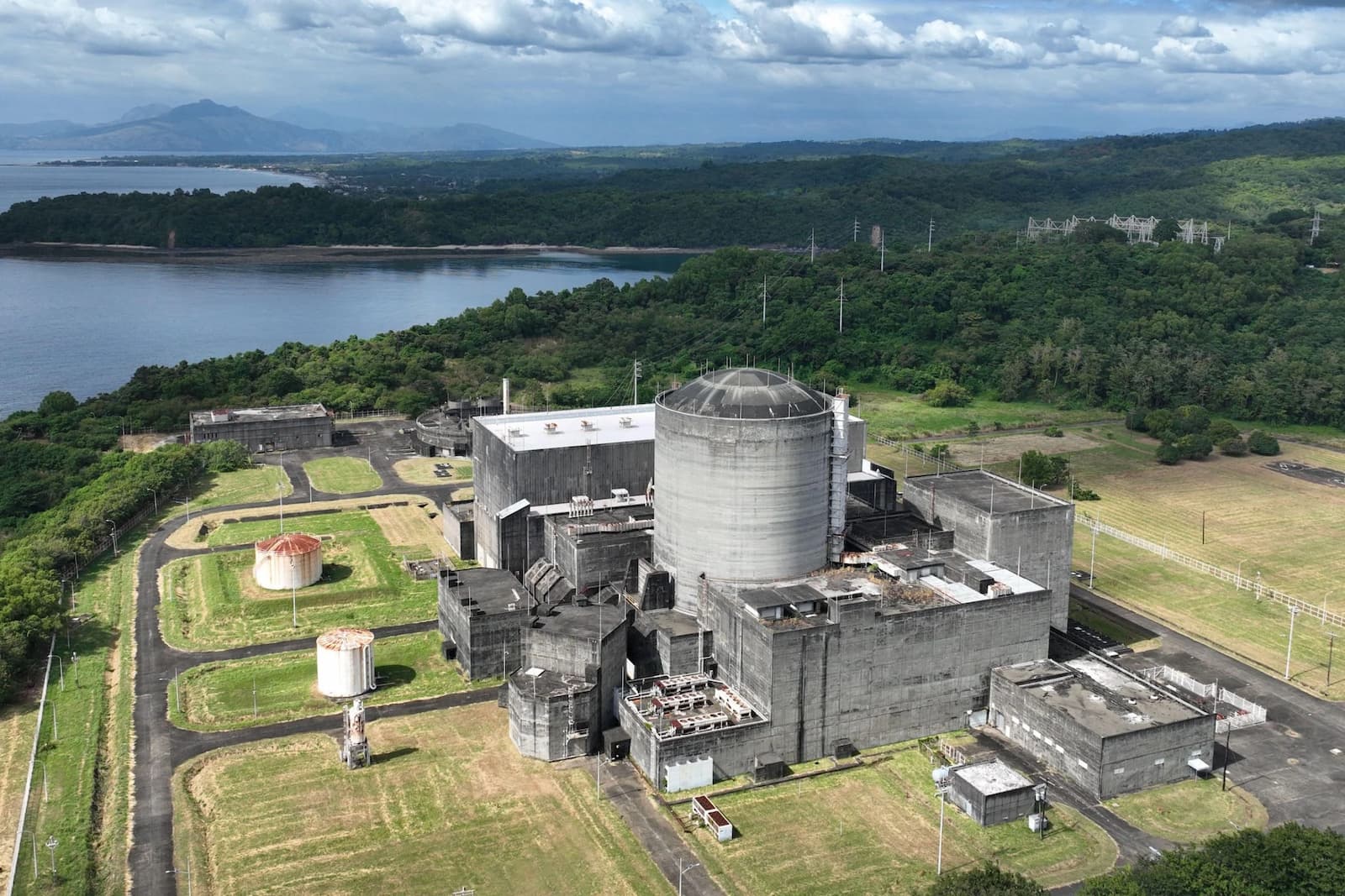 Aerial view of the Philippines’ Bataan Nuclear Power Plant, completed in 1986 but never commissioned. Today, it is being considered for rehabilitation as the country looks to nuclear amid rising electricity demand and pressure to cut emissions (Image: Sherbien Dacalanio / Alamy)