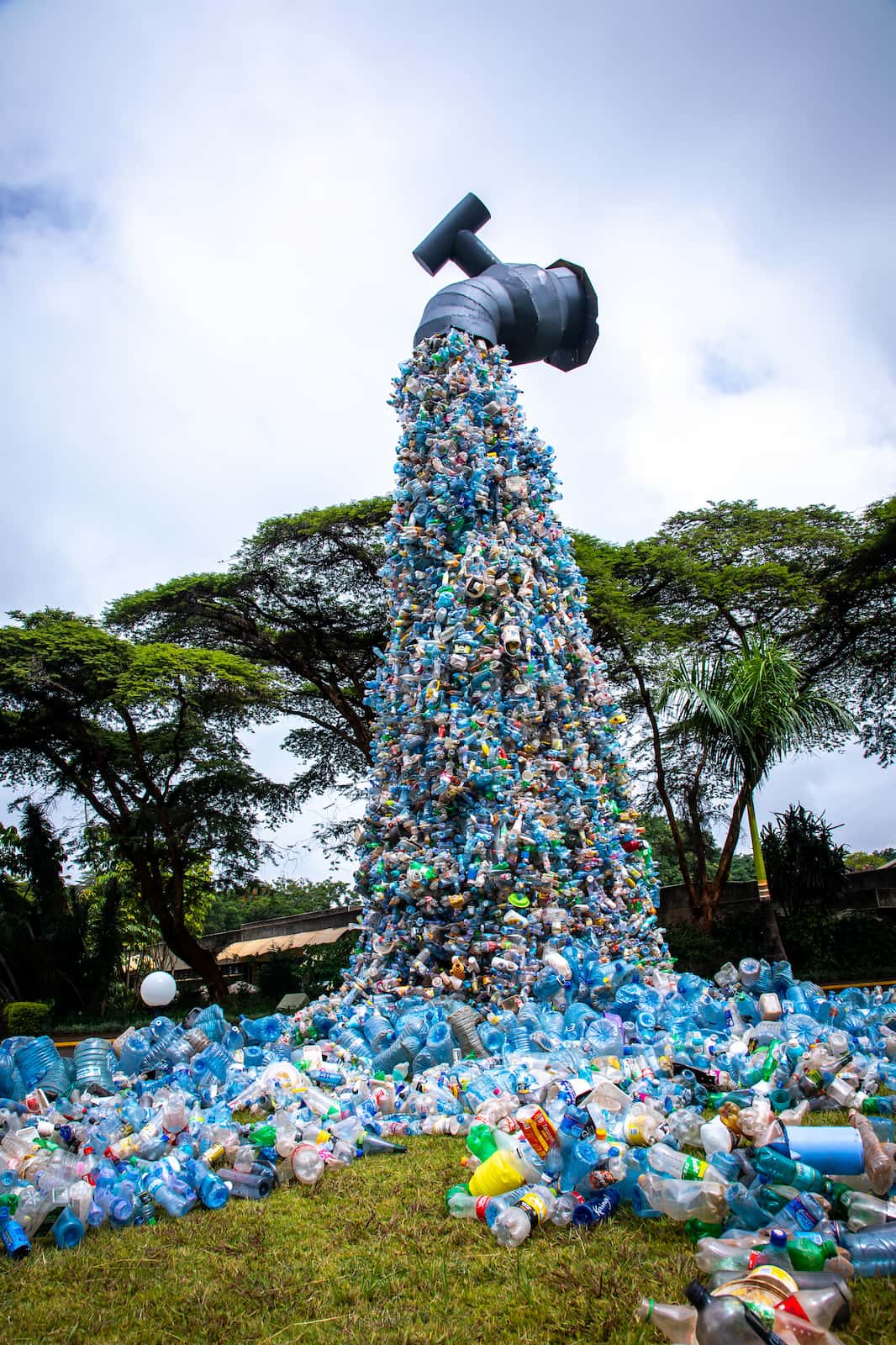 An art installation of a tap spewing plastic sourced from a slum in Nairobi, displayed at the UN Environment Assembly 5.2 that took place in the city in 2022. The most recent round of negotiations in Geneva in August 2025 ended with a weakened draft text (Image: Ahmed Nayim Yussuf / UNEP, CC BY-NC-SA)