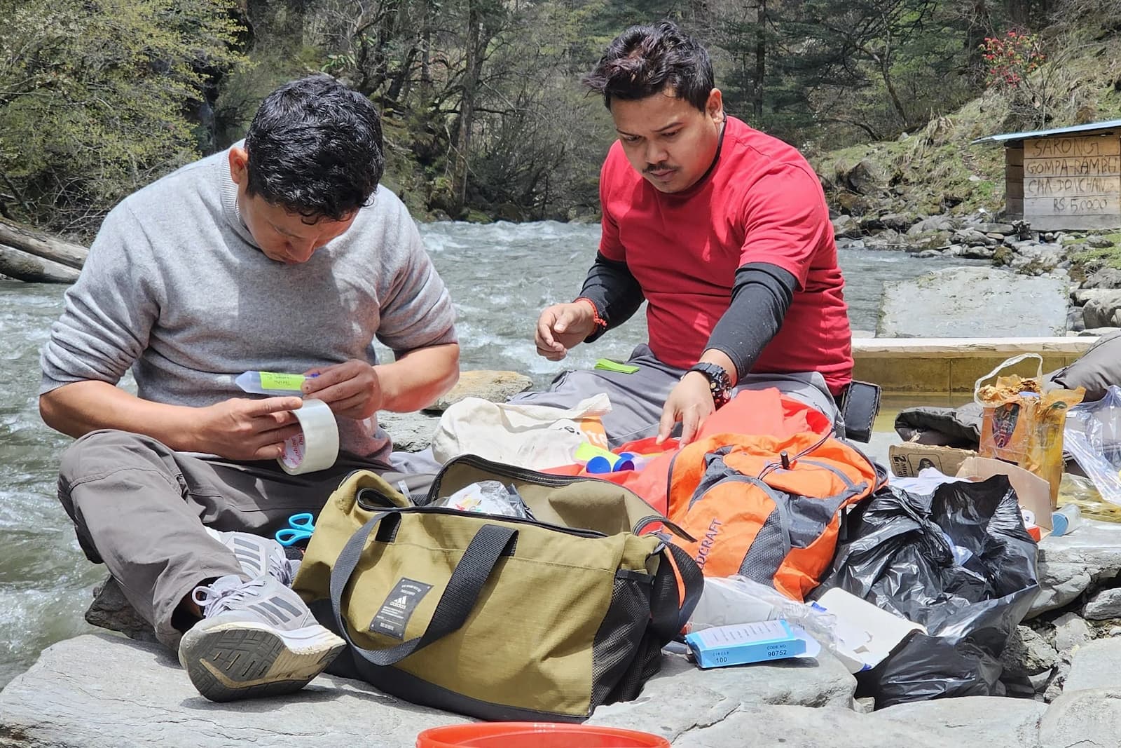 CESHS scientists collect water samples in Tawang district. The samples will be chemically analysed in the lab to learn about the source of the geothermal fluids and how the groundwater is recharged (Image: Centre for Earth Sciences & Himalayan Studies (CES&HS)