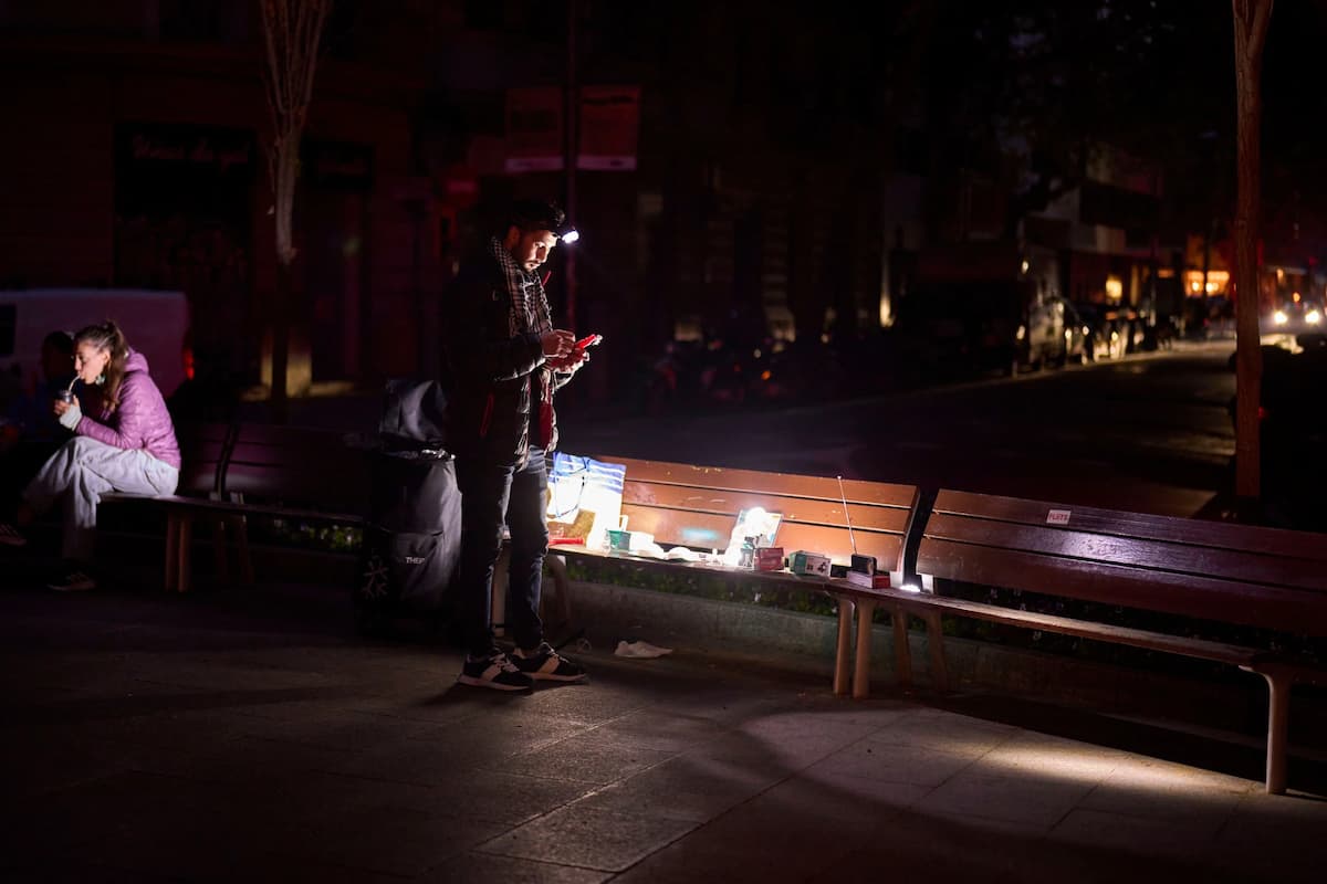 Battery powered radios and torches for sale during a blackout in Barcelona, Spain. Renewable energy was quickly blamed for this widespread April 2025 power cut, but the official findings revealed a more complex set of issues were at play (Image: Emilio Morenatti / Associated Press / Alamy)