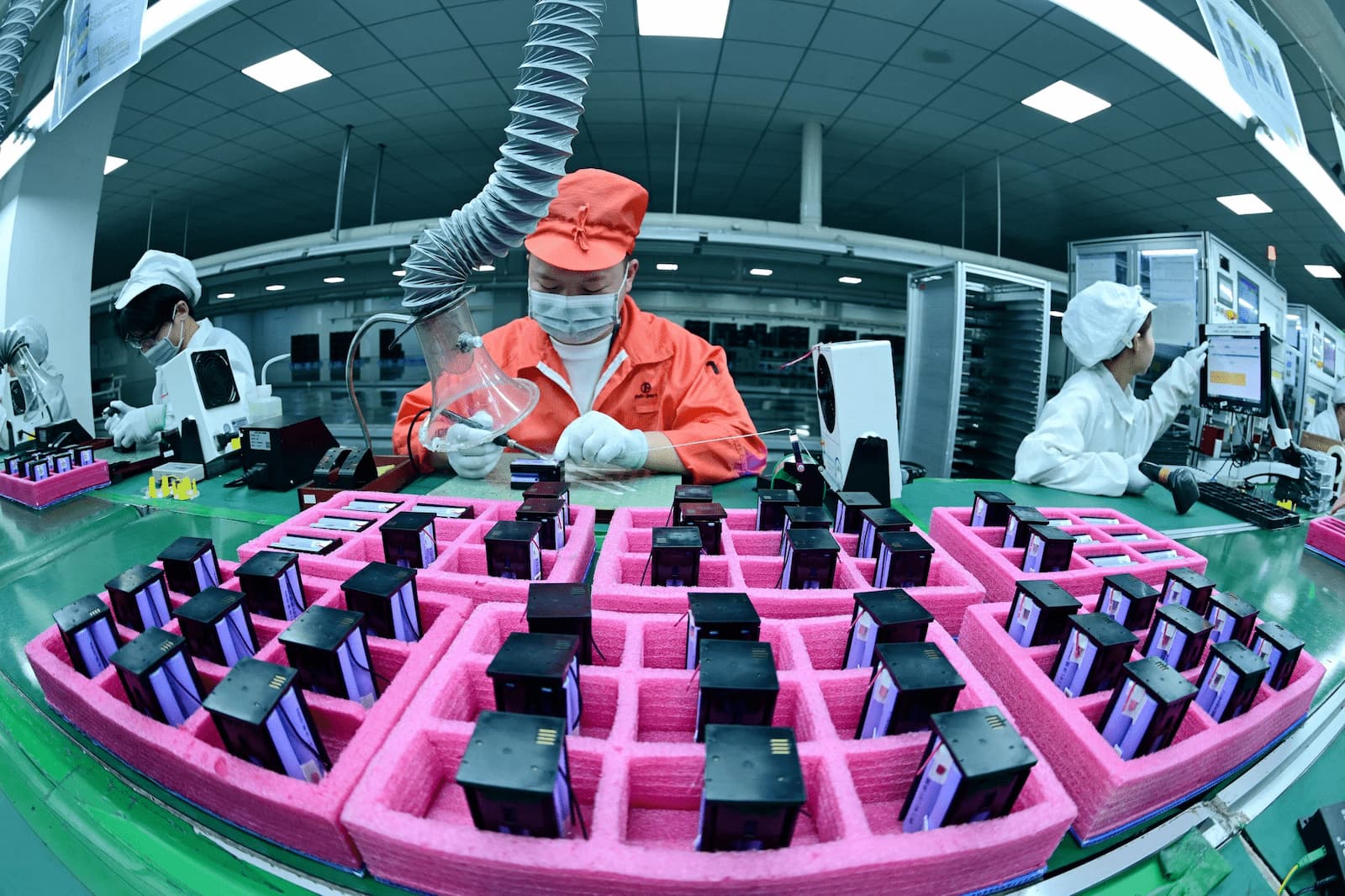 A lithium battery production line in China’s Jiangsu province. The country sits at the heart of the global critical mineral supply chain, dominating midstream processes such as the manufacture of products essential to the energy transition, like these batteries (Image: Sipa USA / Alamy)