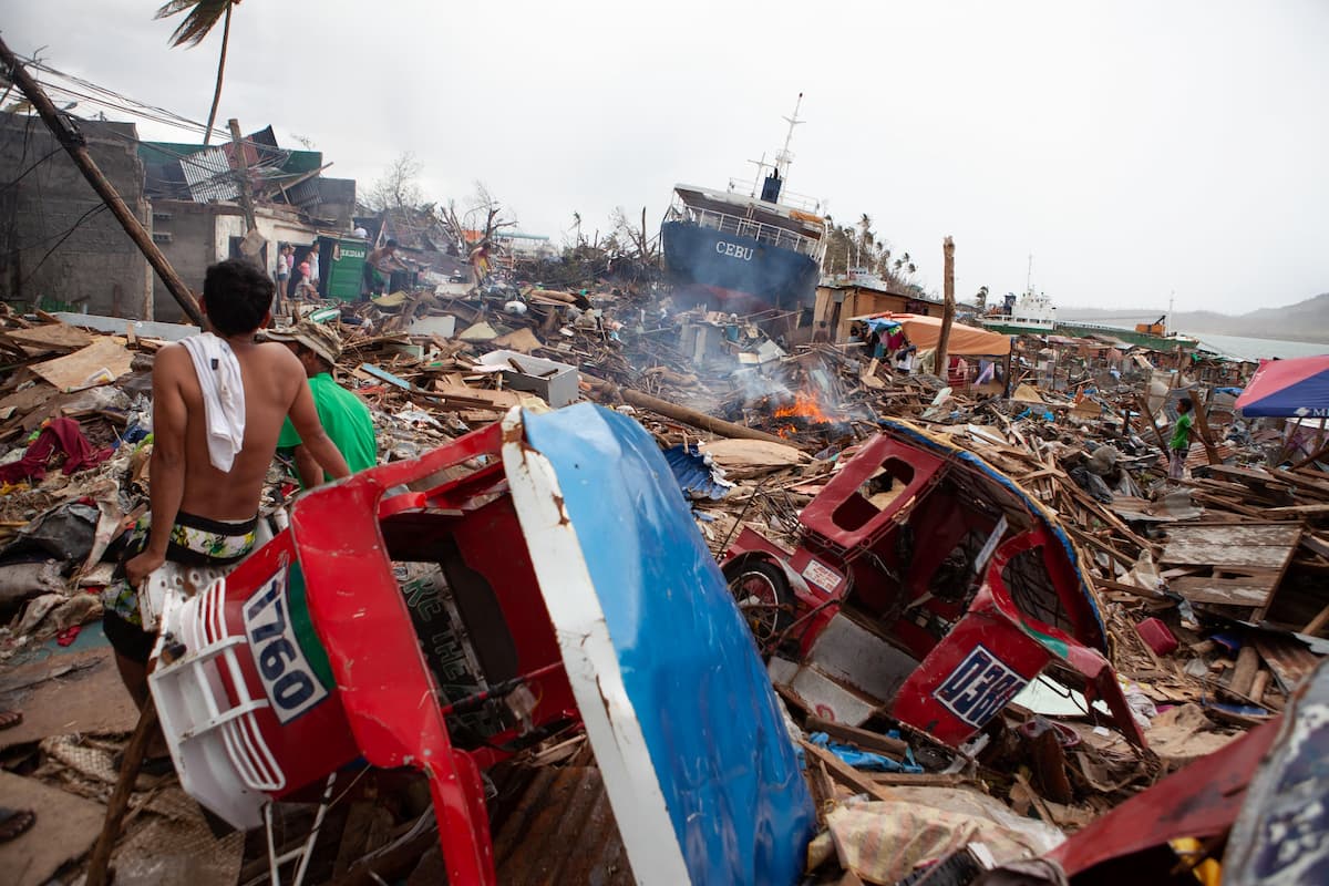 Typhoon Haiyan devastated Tacloban, Philippines, in 2013, pushing cargo ships onto land (Image: Image gallery 2 / Alamy)