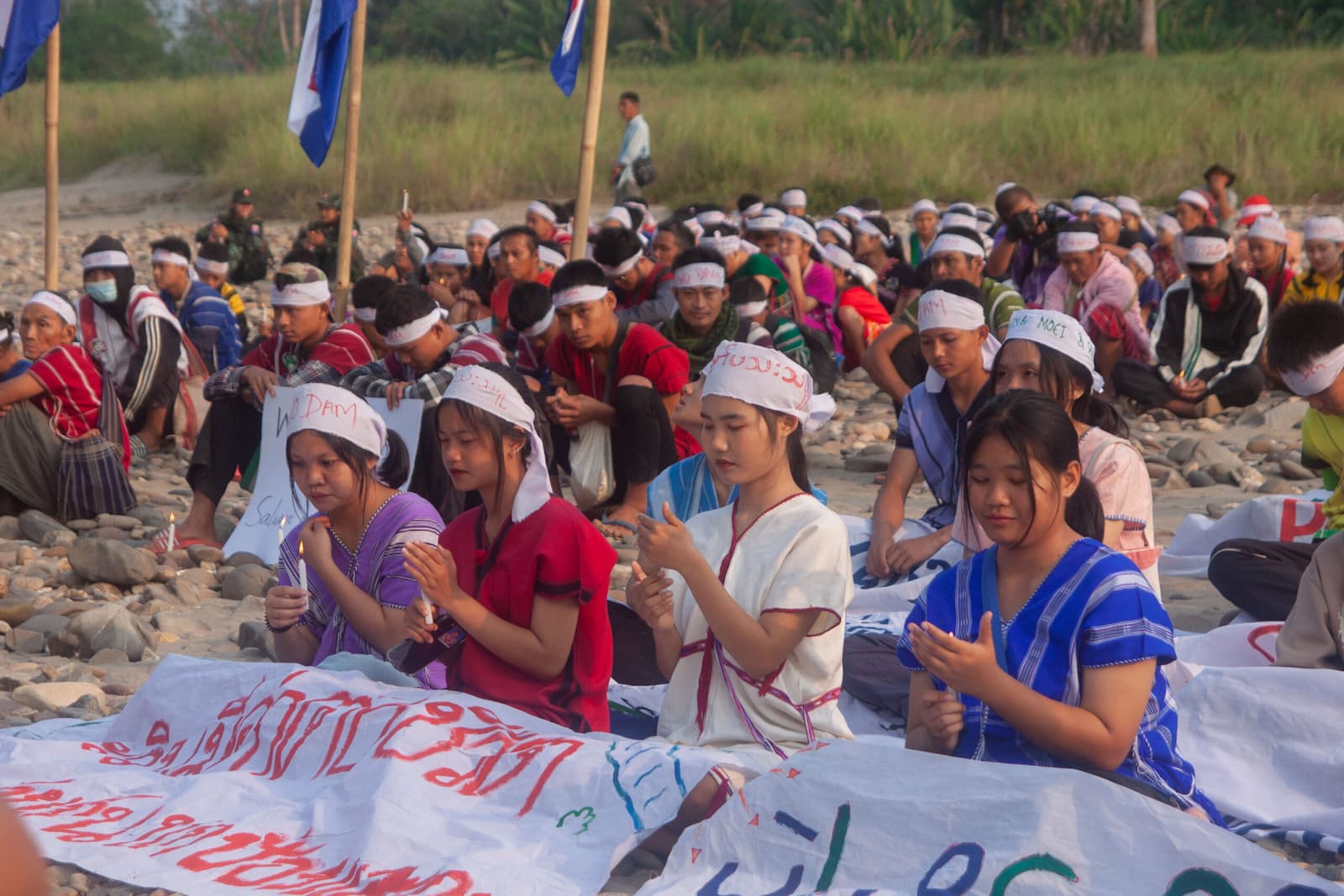 Hundreds of Karen protesters light candles to bless the Salween River and protect it from hydropower dam construction. Image by Gerald Flynn / Mongabay.