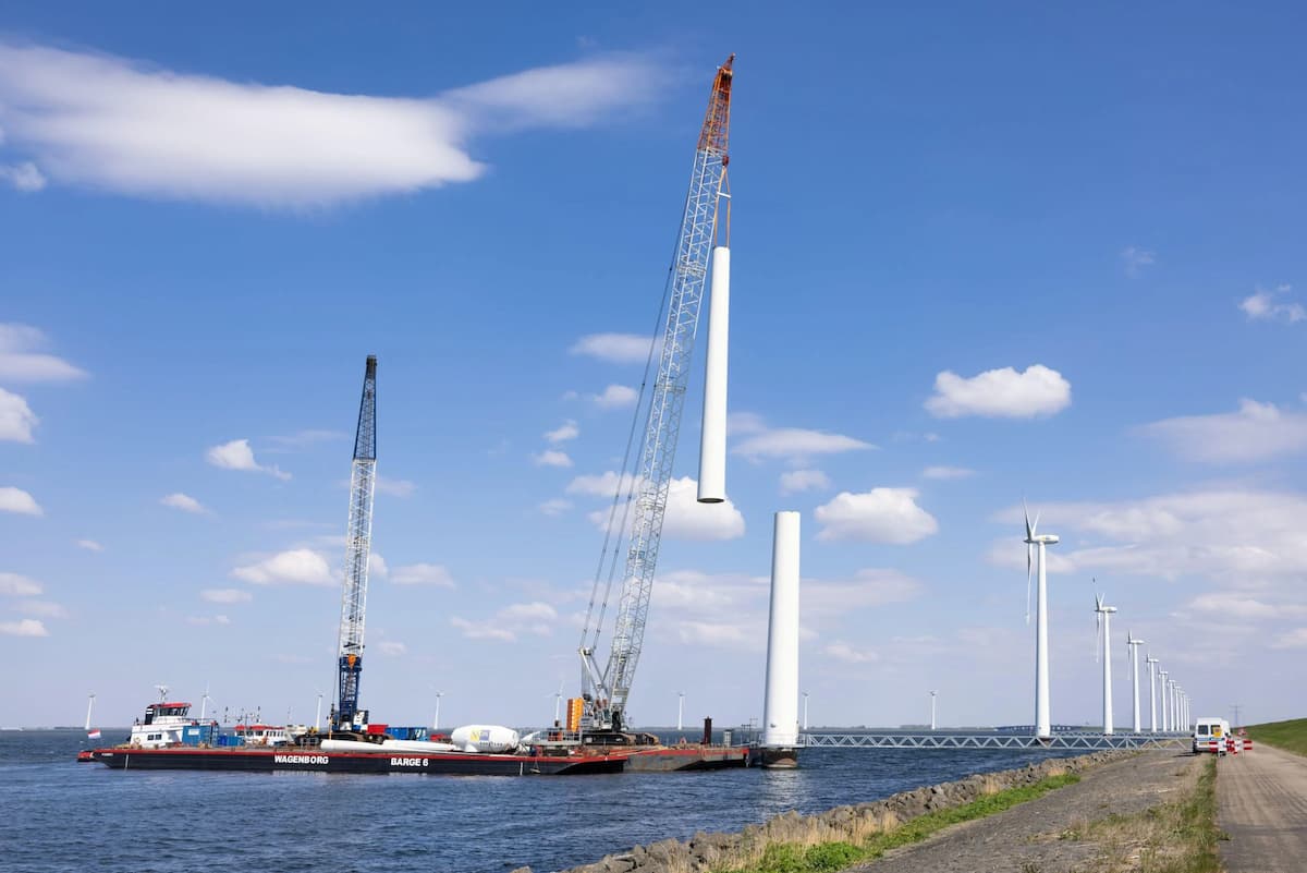 A wind turbine being taken down in Lelystad, the Netherlands. As more and larger turbines are built offshore, the problem of future decommissioning looms larger (Image: Tromp Willem van Urk / Alamy)