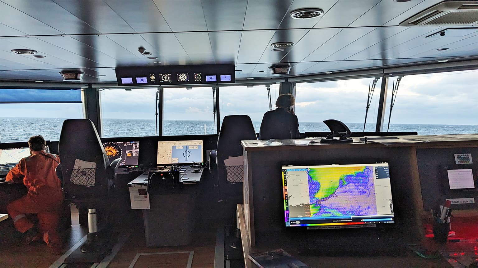 The bridge of the Canopée. It uses a D-Ice Engineering advanced navigation system called OCEANiCS across four stations, three of which can be seen in this photograph. The right station deals with weather analysis and route optimization, the middle with autopilot and control and the left with electronic marine charts. Image courtesy of D-Ice Engineering.