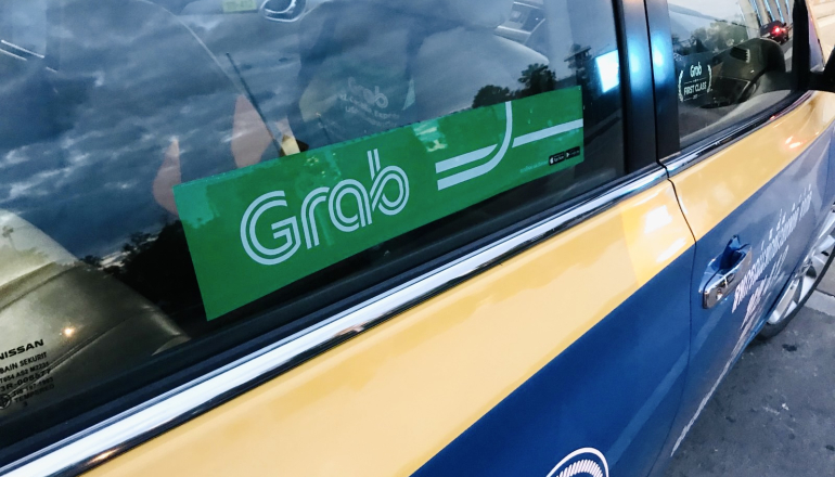 Grab accused of greenwashing over its “carbon neutral” fee